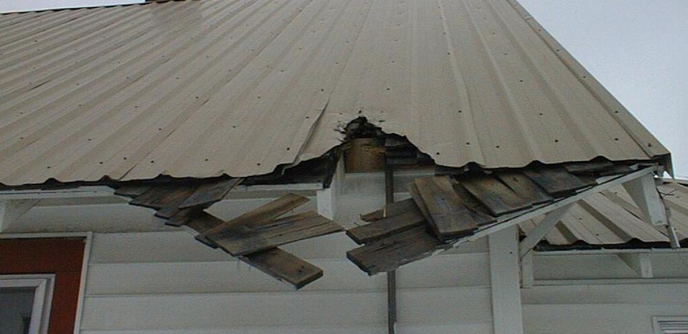 A roof that had a rust spot left untreated that has now broken.